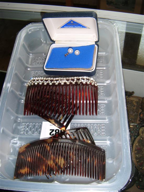 Pair of 9ct gold cultured pearl earrings and 4 tortoiseshell combs